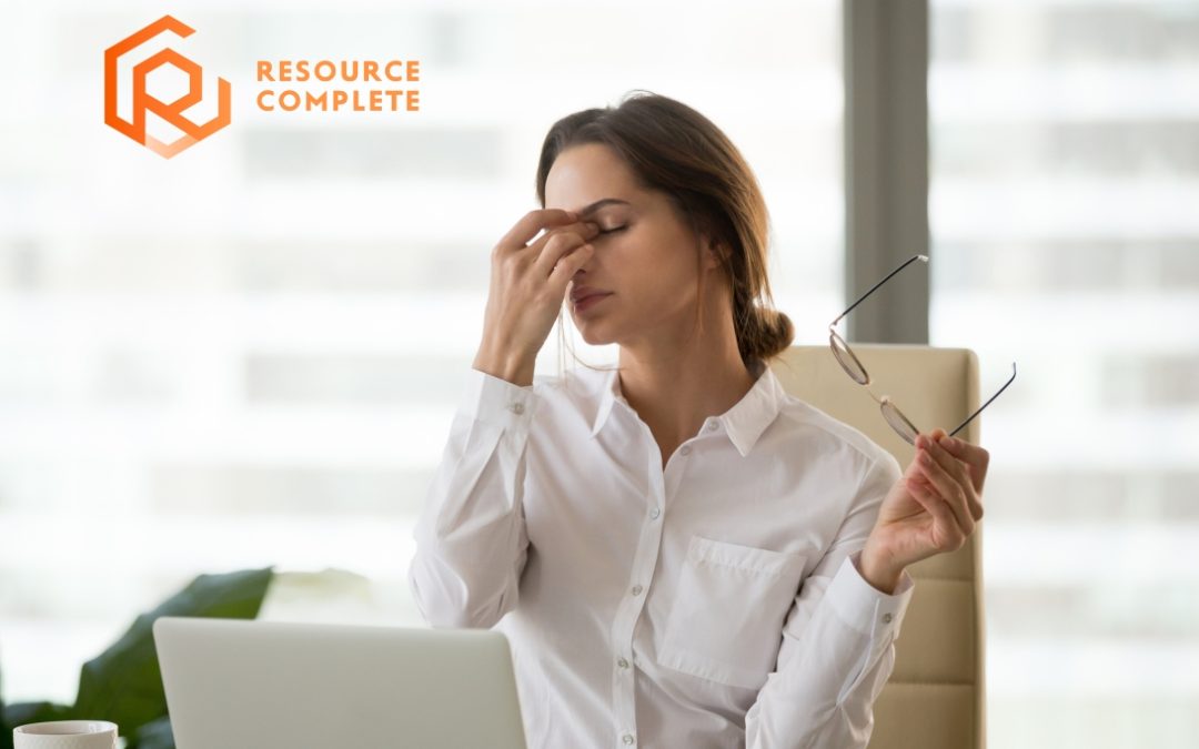 Employee taking a short outdoor break to manage year-end workload and focus