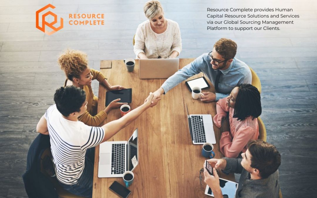 Modern, tidy office desk with laptop, notebook and plant arranged neatly to represent a productivity-focused workspace for the new year.