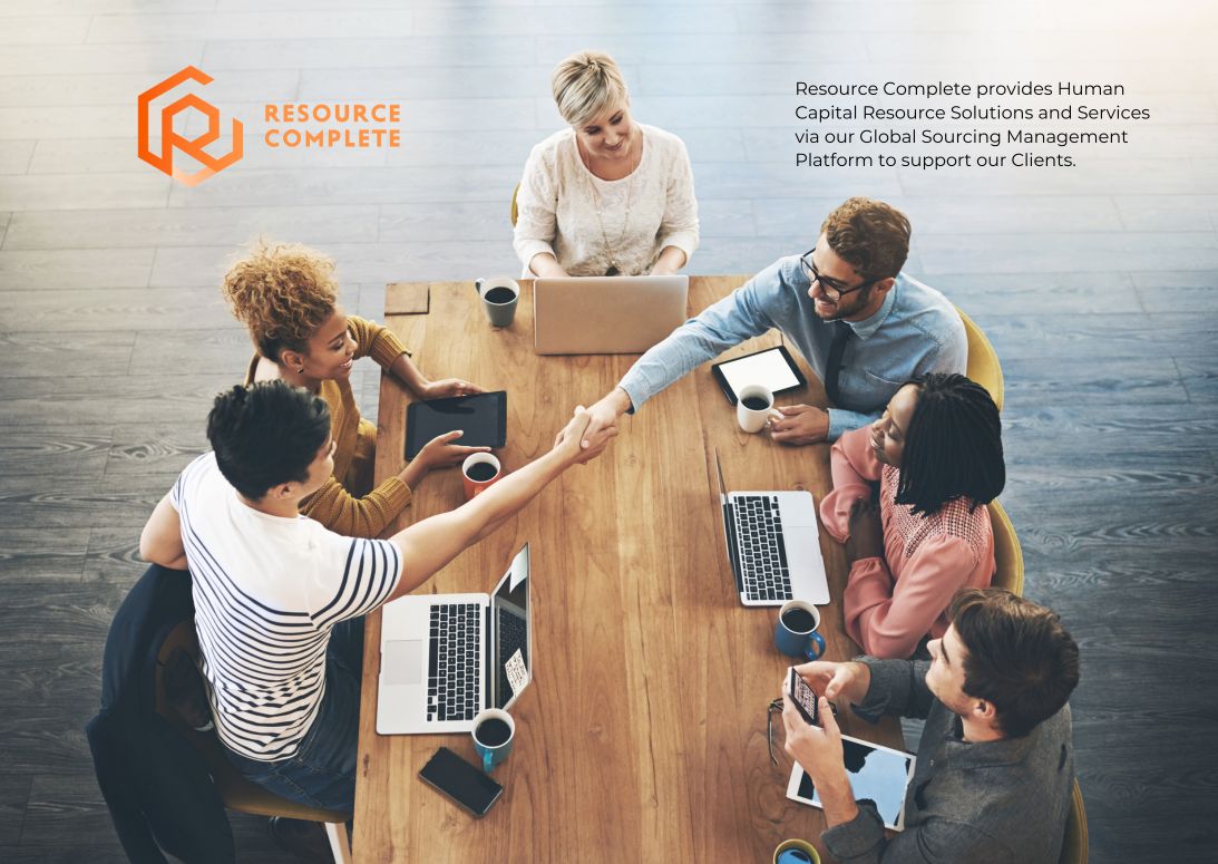 Modern, tidy office desk with laptop, notebook and plant arranged neatly to represent a productivity-focused workspace for the new year.
