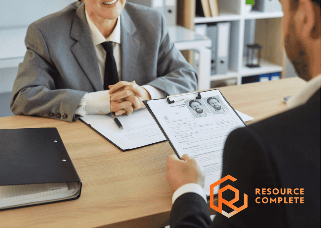 Candidate preparing for recruitment consultant interview questions before a professional screening call.