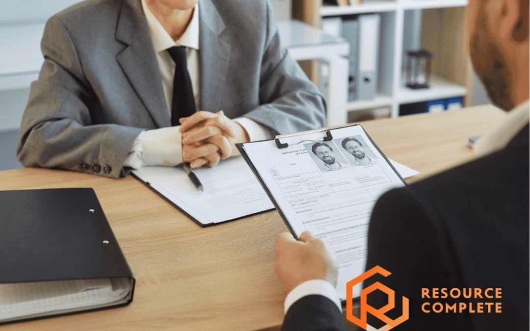 Candidate preparing for recruitment consultant interview questions before a professional screening call.