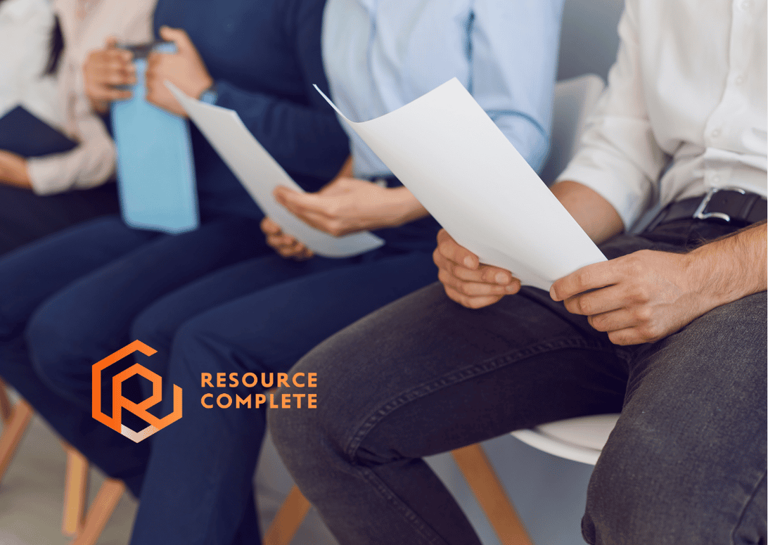Small business team reviewing workforce and recruitment options for future growth