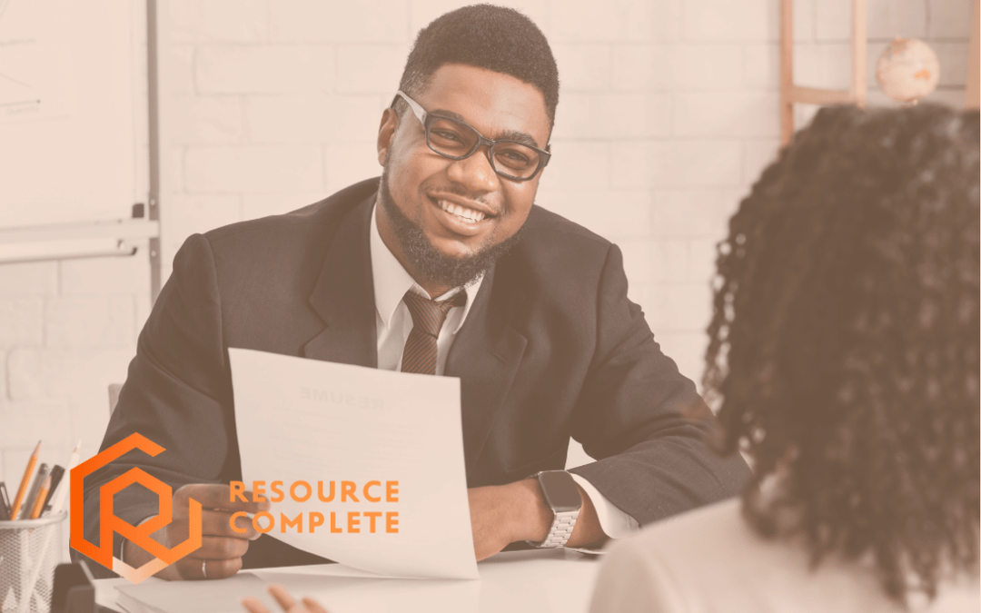 Recruiter reviewing structured candidate screening criteria before scheduling job interviews.